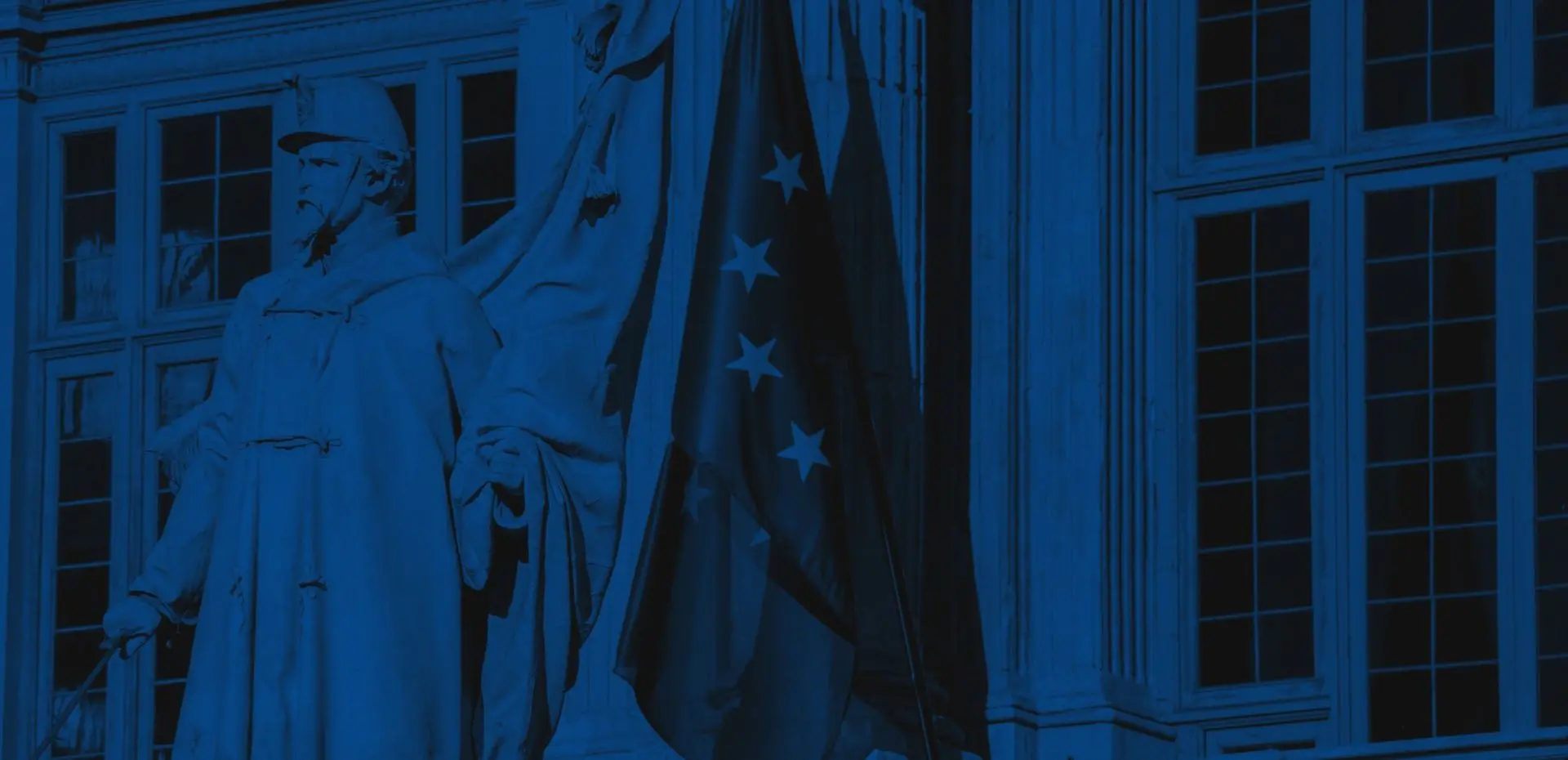 Ia act Ley de ia de la unión europea representada por la bandera de la ue frente a un edificio institucional.